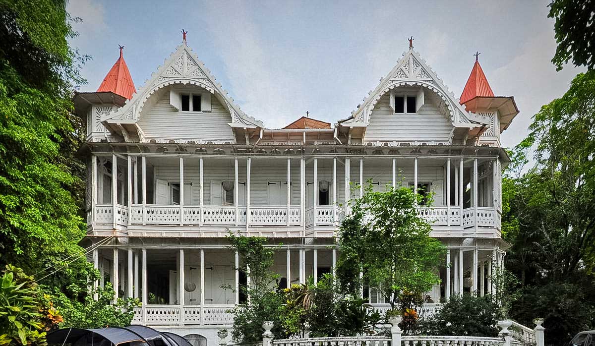 gothic victorian gingerbread mansion with orange roof