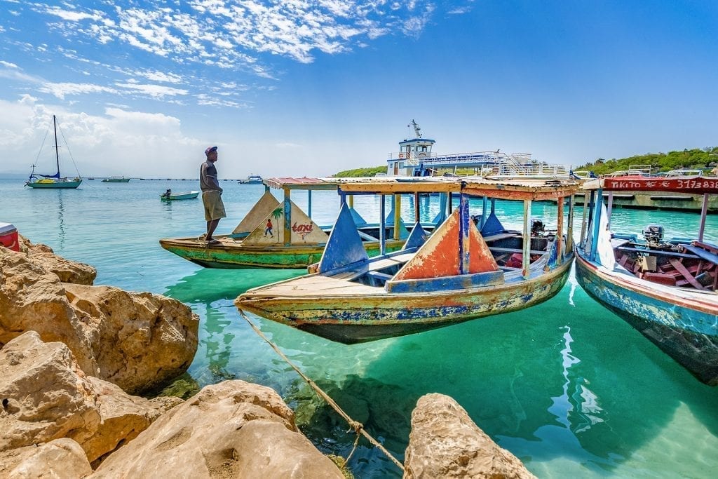 Colorful boat taxis line the shore at Cap-Haitien, Haiti