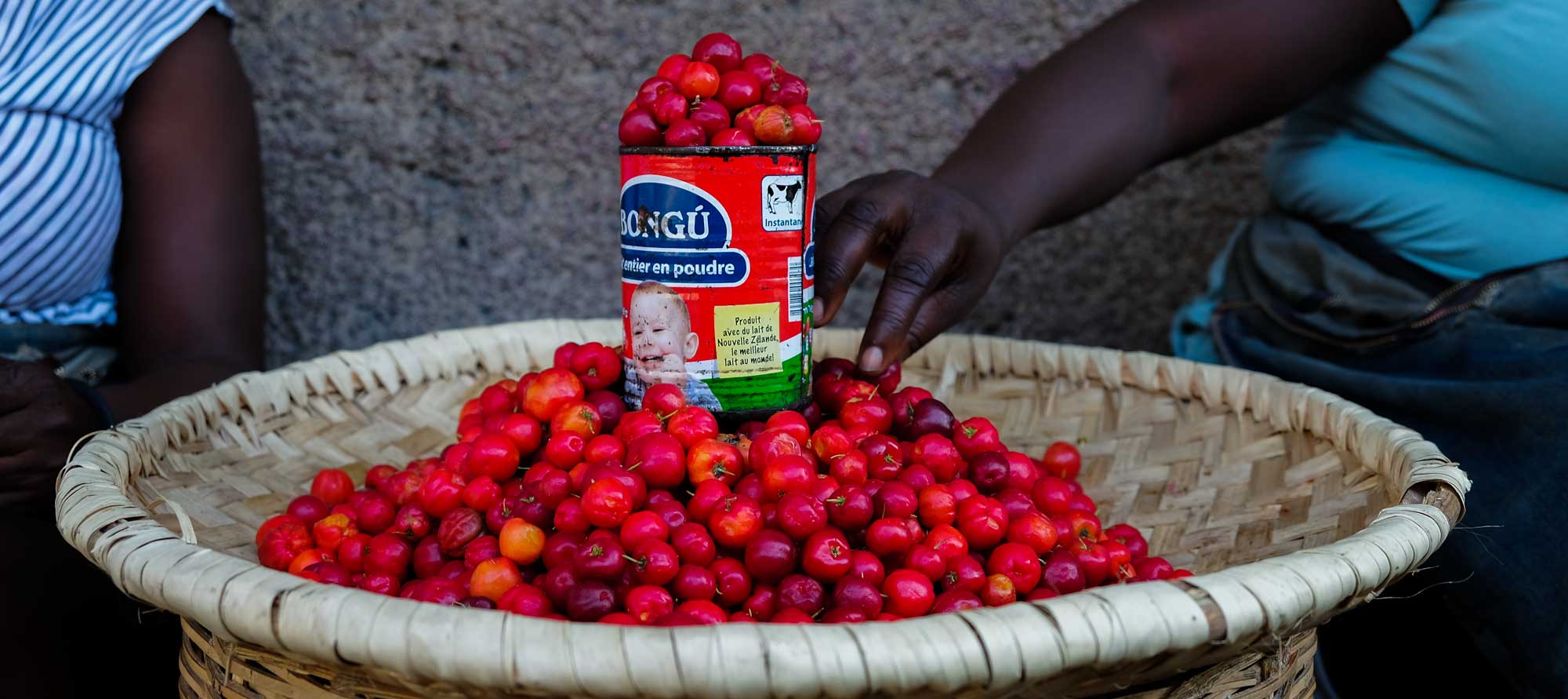 Fresh cherries on display at a market in Haiti