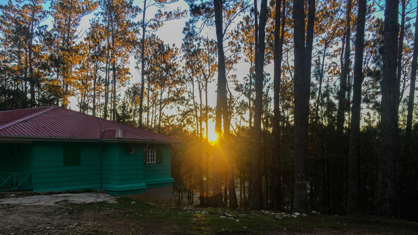 Sunset next to a hotel in the forest of Forêt des Pins, Haiti