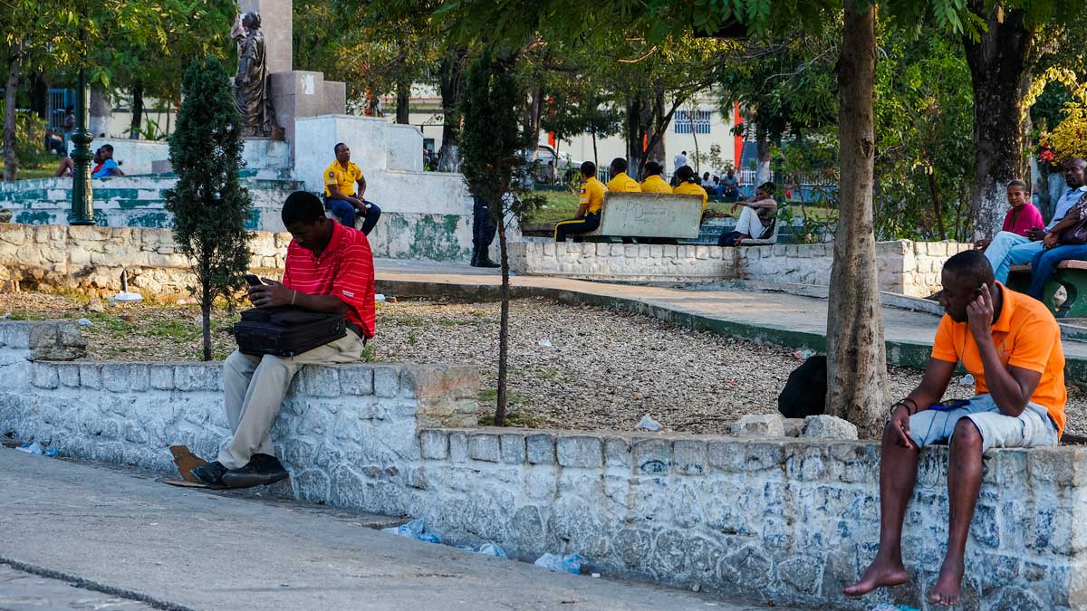 People hanging out in Place St. Pierre, Haiti