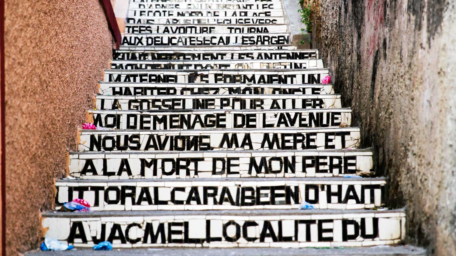 Stairs with a mosaic of words in Jacmel, Haiti