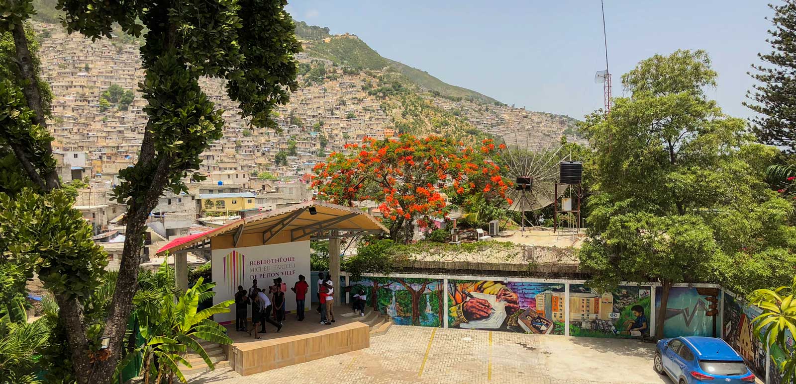 Group of Haitians on stage below the Petion-Ville library in Port-au-Prince, Haiti