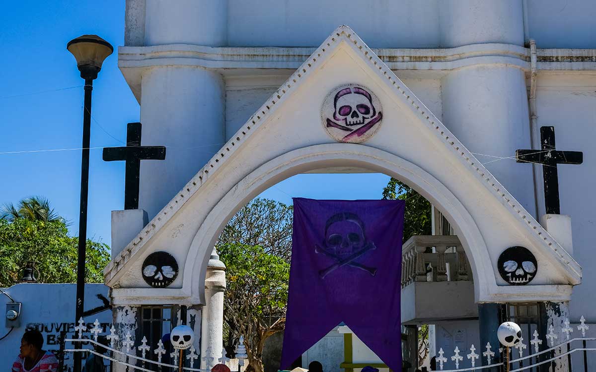 entrance to haitian cemetery decorated for fet gede celebrations