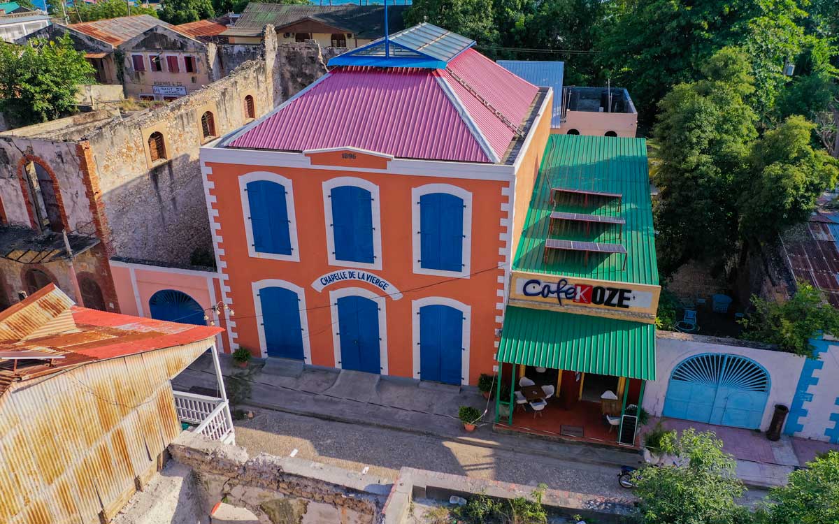 old colonial houses on city street in jacmel