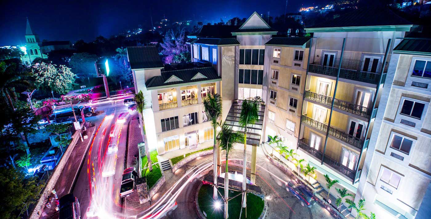 nighttime view of large hotel in port-au-prince