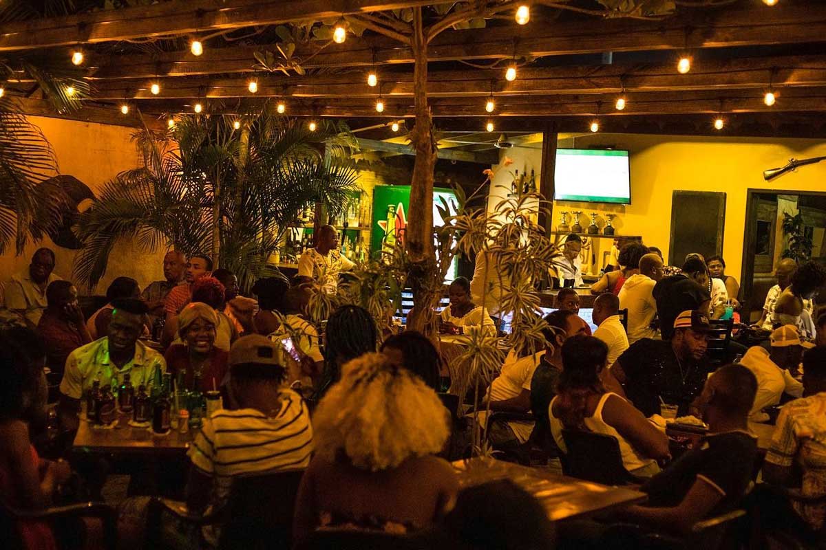 people seated in dining area inside a restaurant