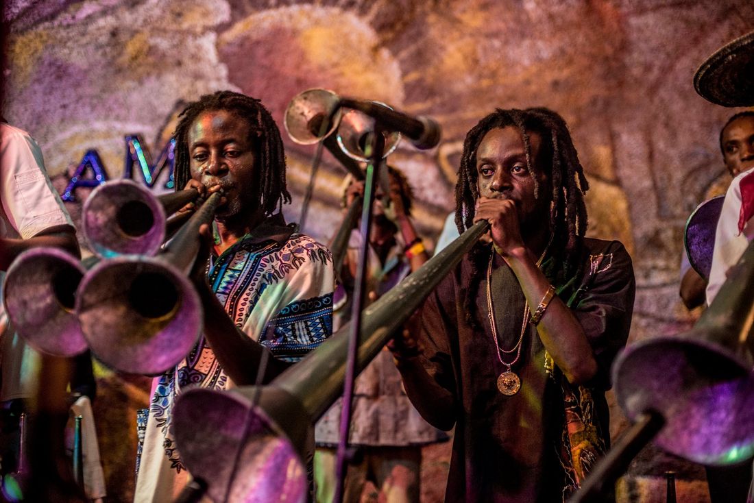 haitian musicians playing on trumpets