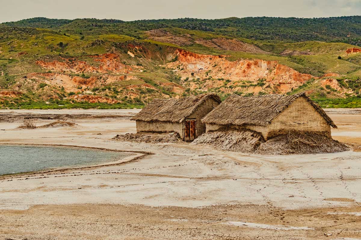 edge of a lake with two vernacular 